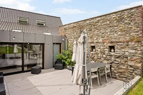 Renovated home with garden and solar panels