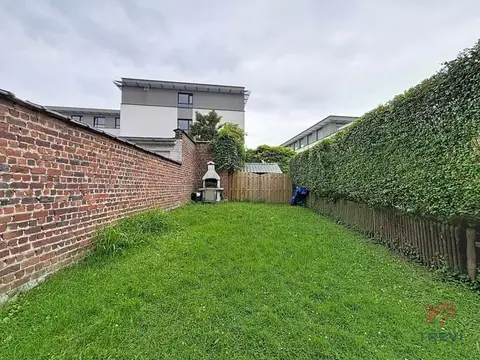 A beautiful 4 bedroom house with a garage and garden
