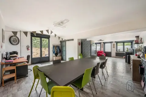 219-square-meter house with a 125-square-meter workshop