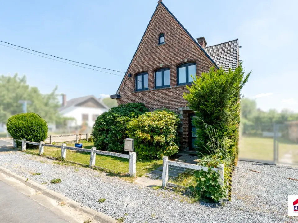 Woning met veel potentieel en aangename tuin in Buizingen