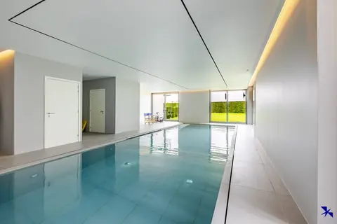 Stylish apartment with water view and indoor swimming pool